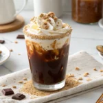 Craving that CosMc’s S’Mores Cold Brew? Make it at home with this easy DIY recipe! Creamy, chocolatey, and topped with toasted marshmallows—your new favorite coffee treat awaits.